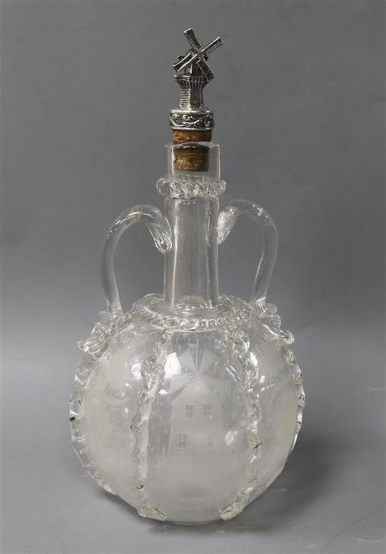 A 1920s Dutch etched two handled glass decanter with silver mounted stopper, 26.9cm.